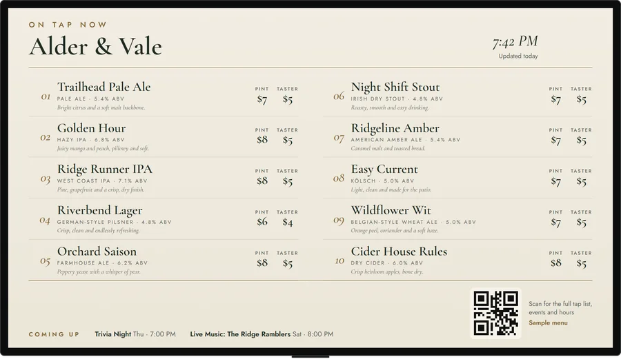 A TV showing a tap list in a light menu-card style